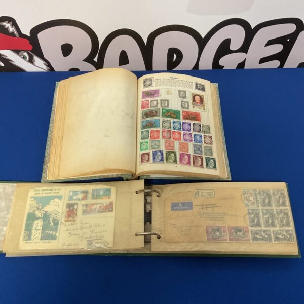 Open vintage stamp album showing British and German stamps.