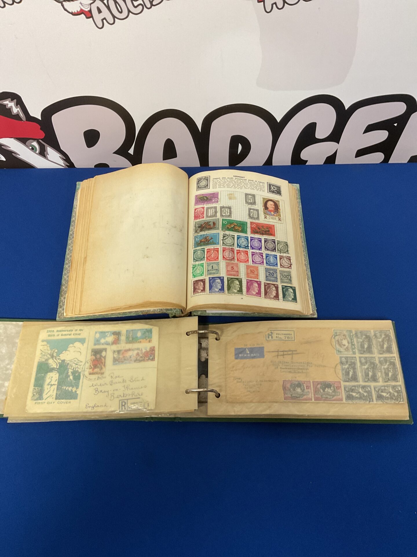 047 Two stamp albums including british & german hitler stamps