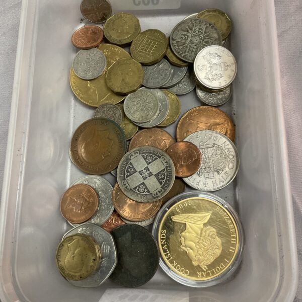 Vintage assorted coin lot with British and mixed denominations.