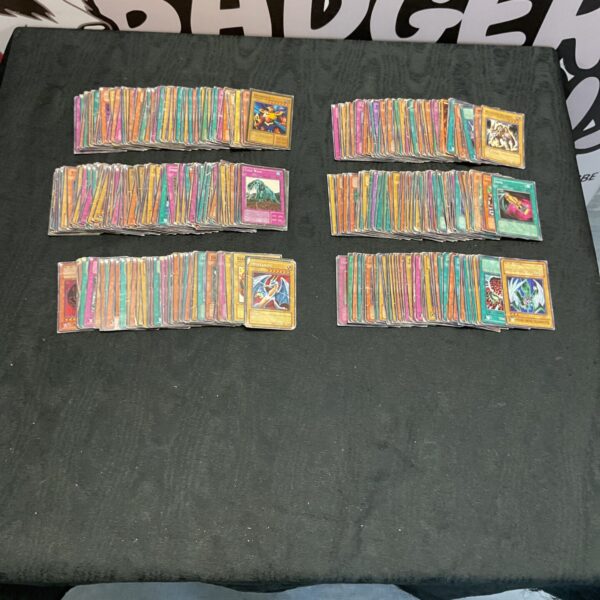 Large lot of Komani Yu Gi Oh trading cards for collectors.