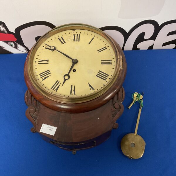 Antique mahogany drop dial wall clock with pendulum.