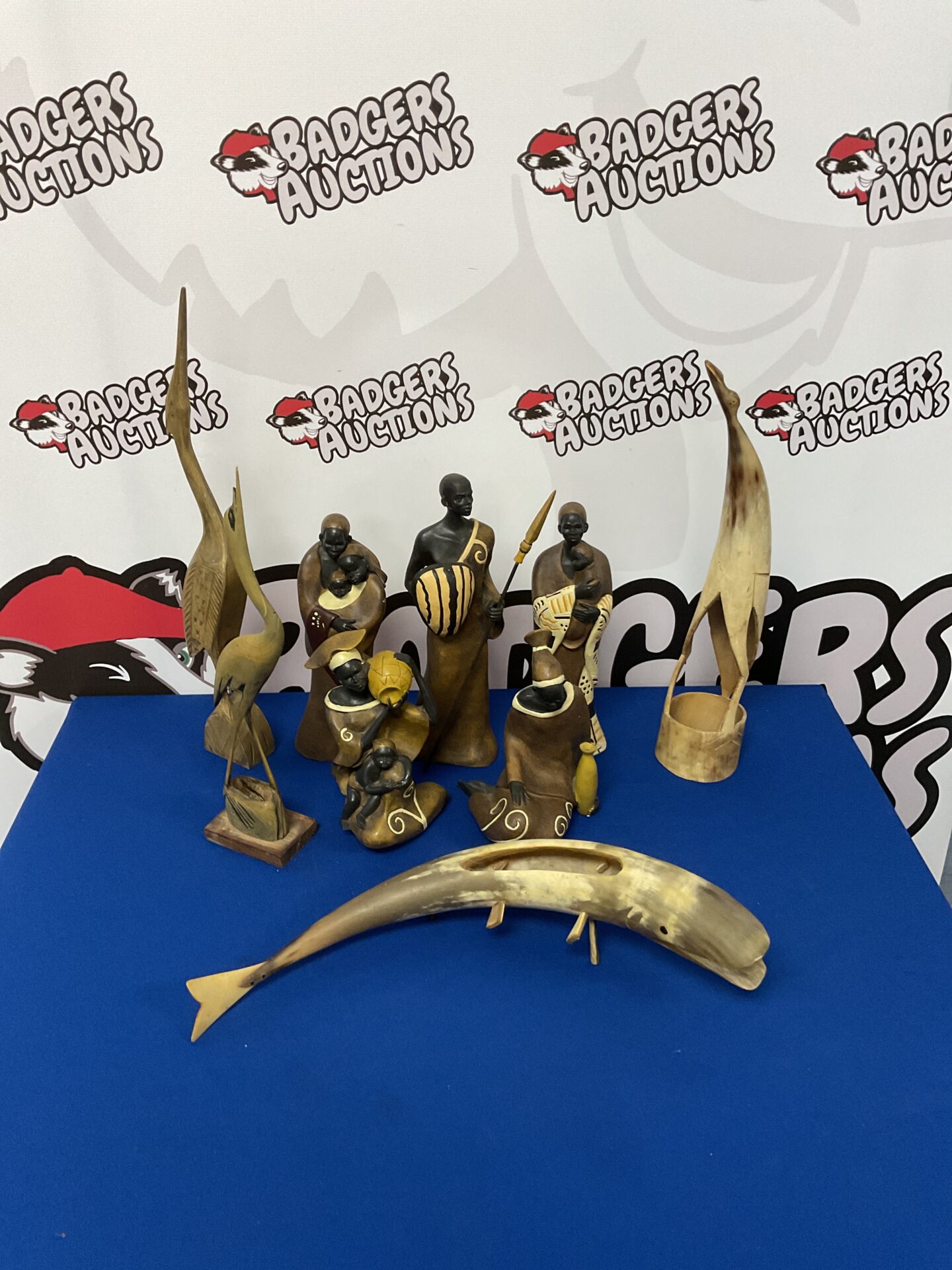 075 Five tribal african figures & three carved horn storks & shark