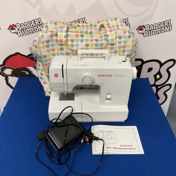 Vintage Singer Promise sewing machine in good condition.