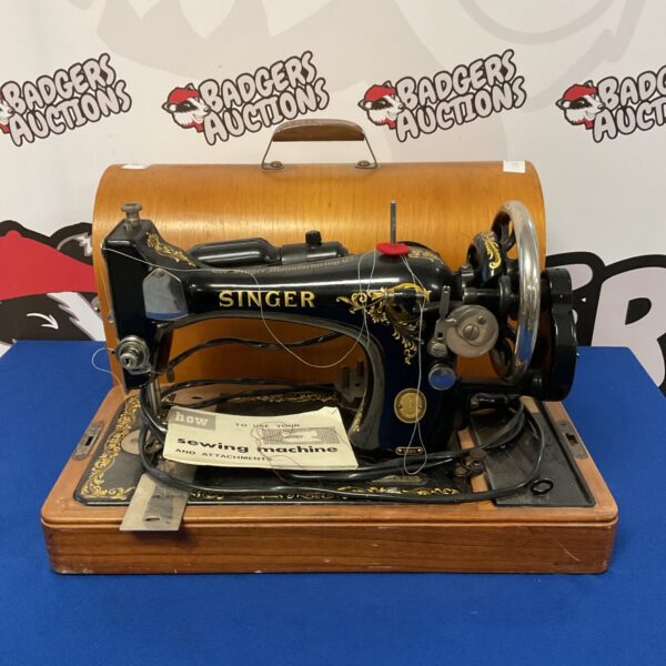 Vintage Singer 128k industrial sewing machine in good condition.