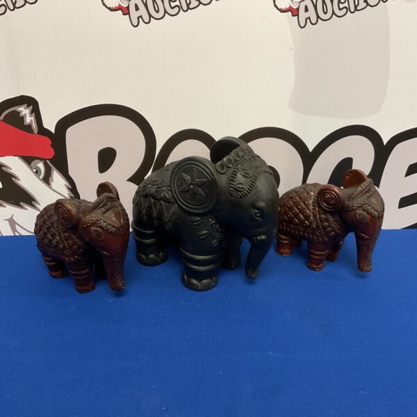 Vintage terracotta elephants, a collectible Indian figurine set.