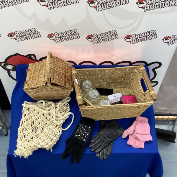 Wicker baskets filled with mixed items, including gloves.