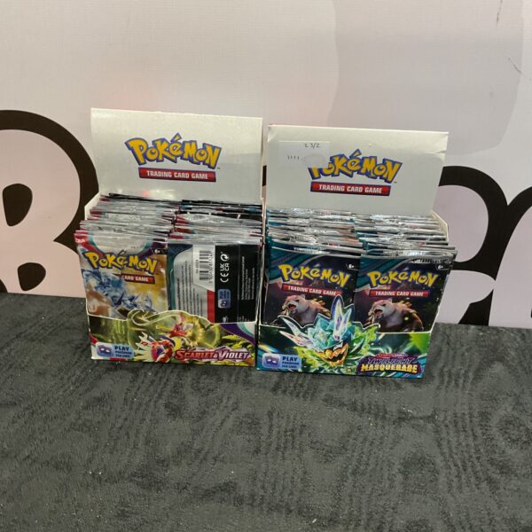 Opened Pokemon Scarlet and Violet booster boxes for trading card game.