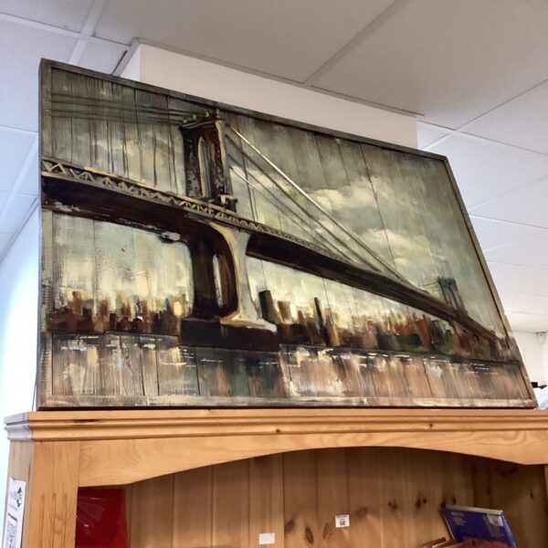 Large 3D Brooklyn Bridge artwork with textured cityscape details.