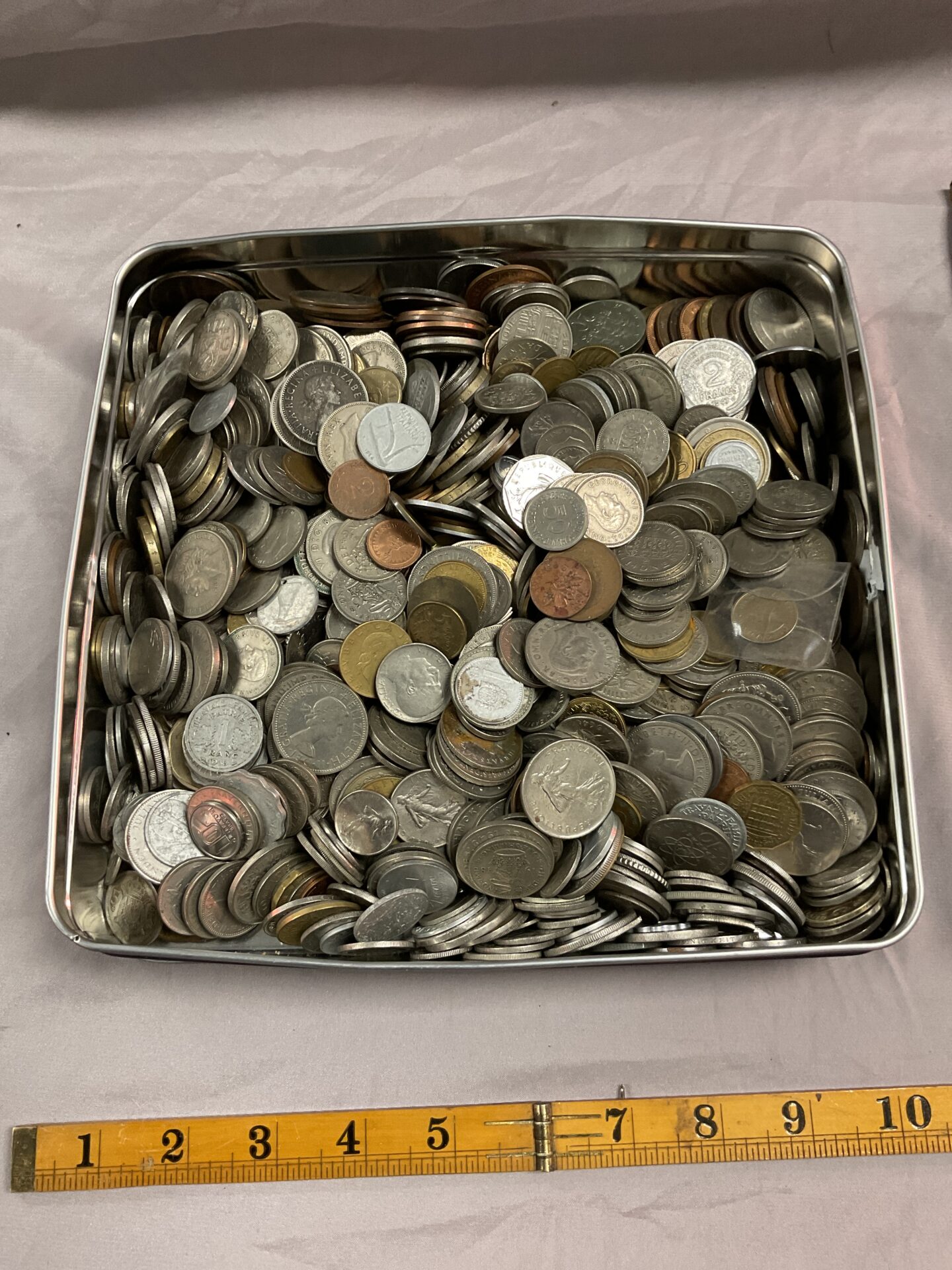 889 Tin of assorted coins approx six kilo