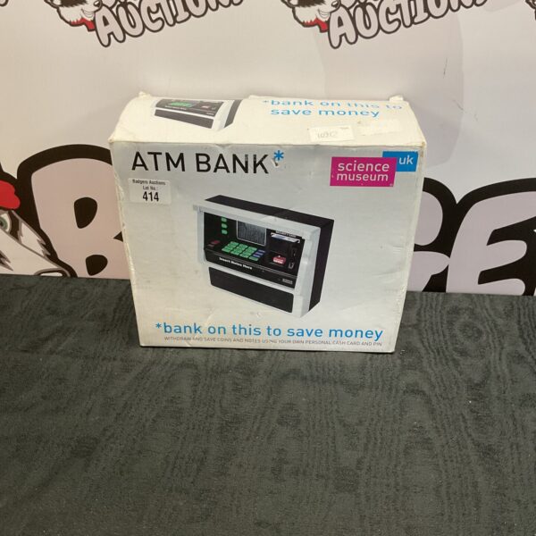 Front view of the Science Museum ATM bank, a collectible novelty item.