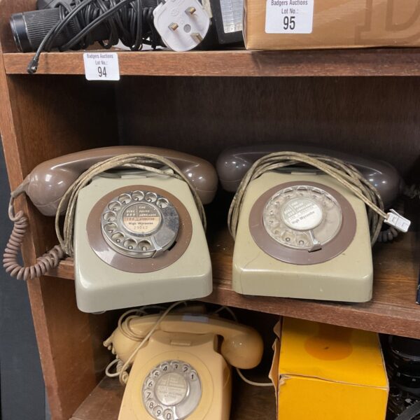 Pair of vintage High Wycombe rotary telephones in a vintage setting.