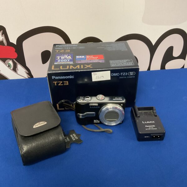 Panasonic Lumix TZ3 digital camera, silver, front view.