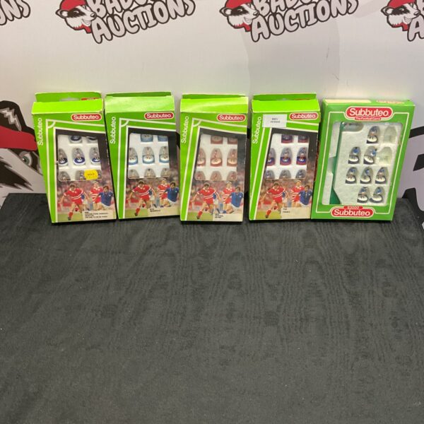 Five boxes of vintage Subbuteo football figures for collectors.