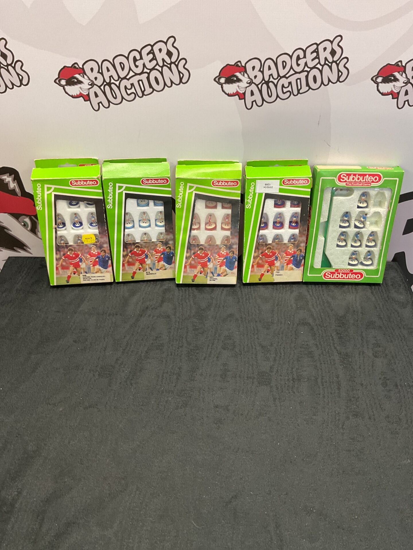 412 Five boxes of subbuteo football figures