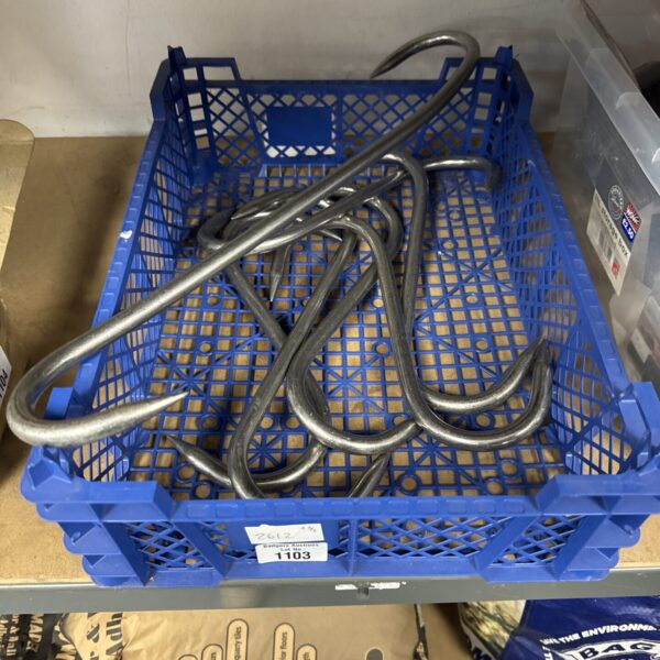 Set of vintage iron meat hooks for hanging meat.