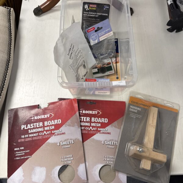 Assorted hardware and tool lot for DIY projects and home repair.
