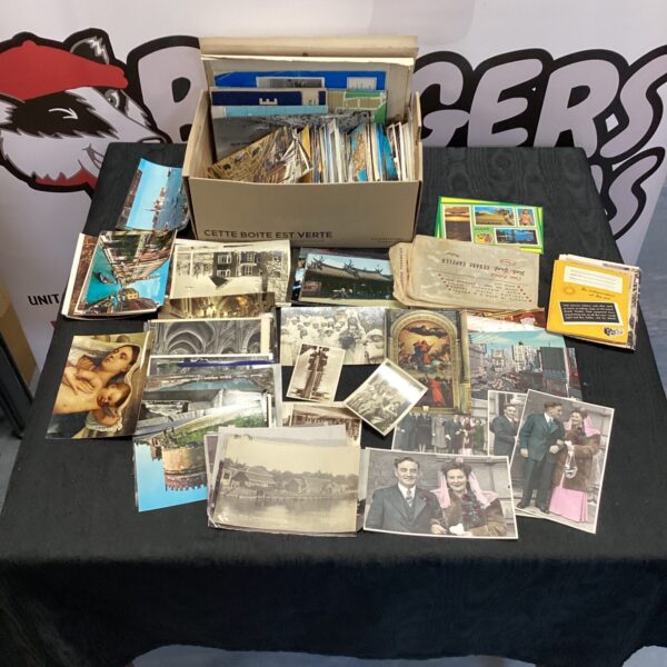 Large lot of vintage postcards from around the world.