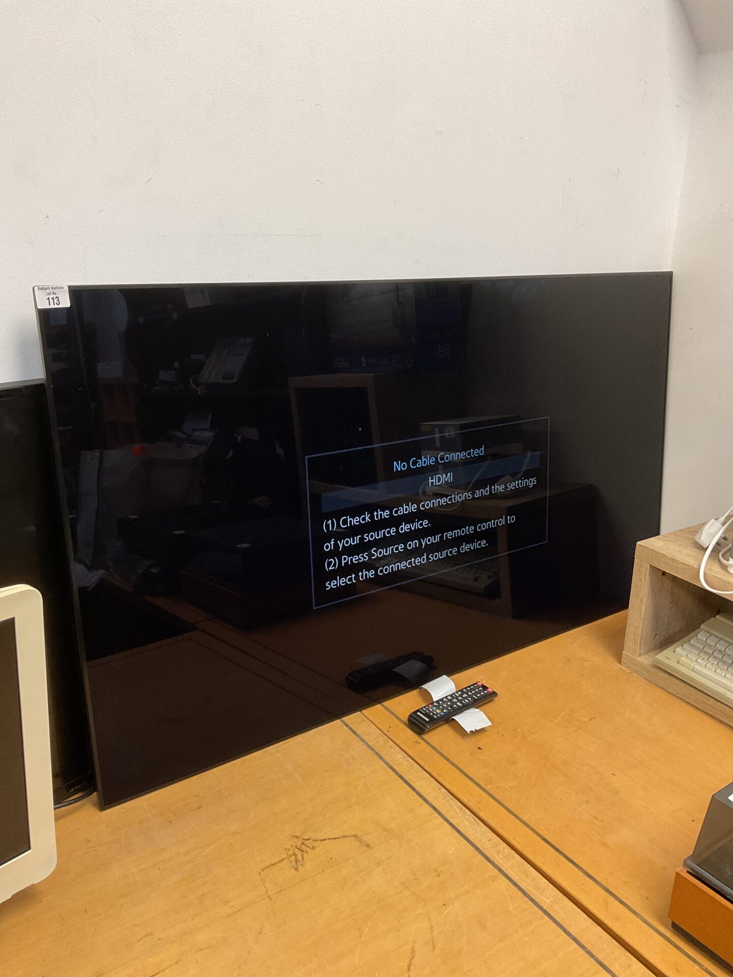 113 Samsung 55” hd tv with remote powers on untested further
