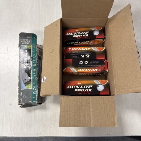 Dunlop Ddh 110 golf balls and brush lot for sale.