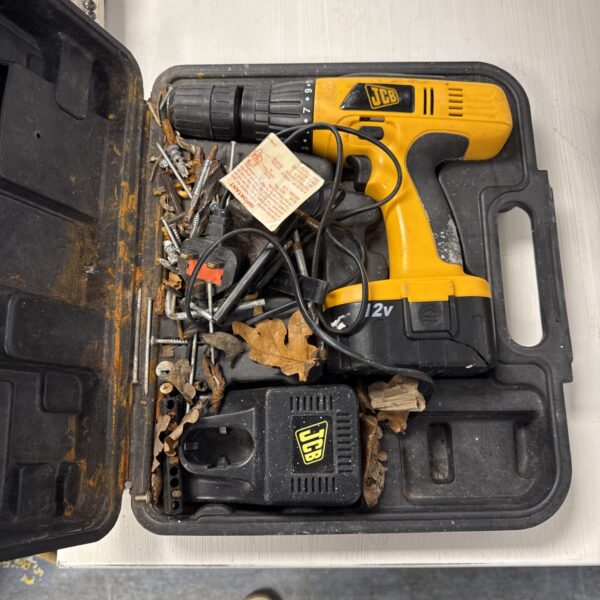 JCB cordless drill set in open carrying case with bits.