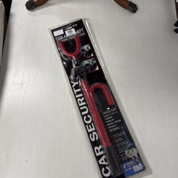 New J Mech car steering wheel lock in original packaging.