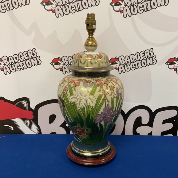 Hand-painted Chinese table lamp with vibrant floral design.