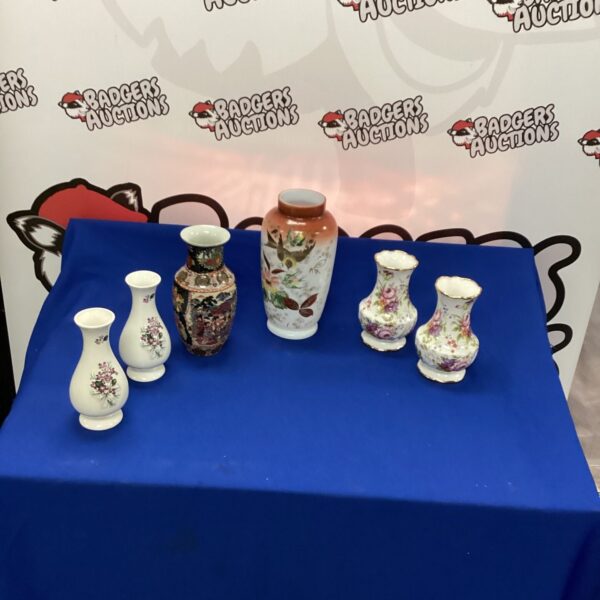 Antique Staffordshire vases with floral designs, a collectible bone china selection.
