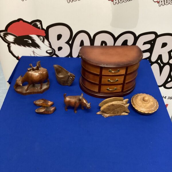 Vintage wooden jewellery box for storing trinkets and small items.