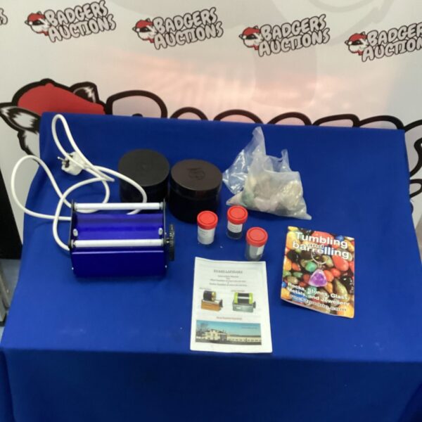 Evans Lapidary polishing kit with polishing compounds and machine.