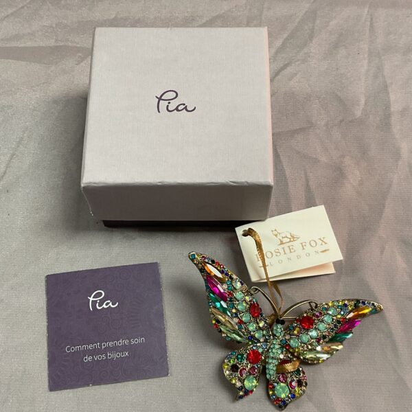 Colourful jewelled butterfly brooch by Rosie Fox London.