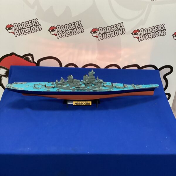 Detailed scale model of the USS Missouri battleship, a collectible naval ship.