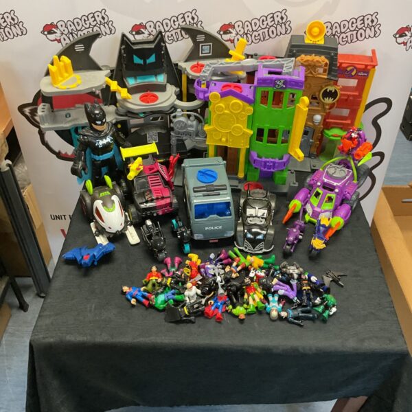 Large lot of Imaginex DC Comics playsets and action figures.