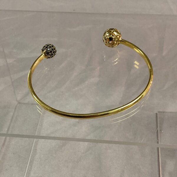 Vintage silver gilt bracelet with floral filigree design.