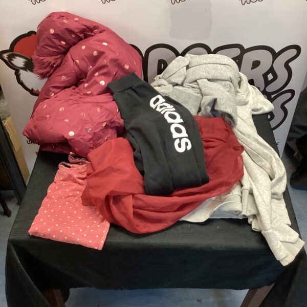Mixed lot of kids clothing including Adidas tracksuit bottoms.