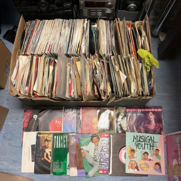 Large lot of 7 inch vinyl singles from the 1980s and 1990s.