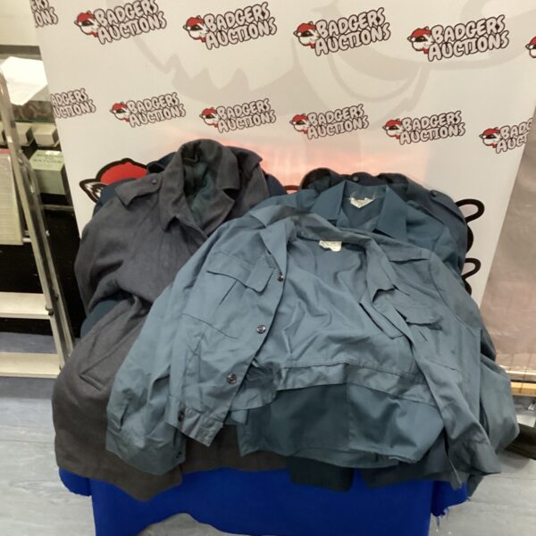 Vintage RAF and USAF uniform lot including jackets and shirts.