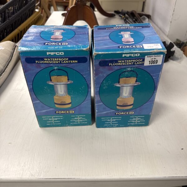 Two vintage Pifco Force 10 waterproof fluorescent lanterns.