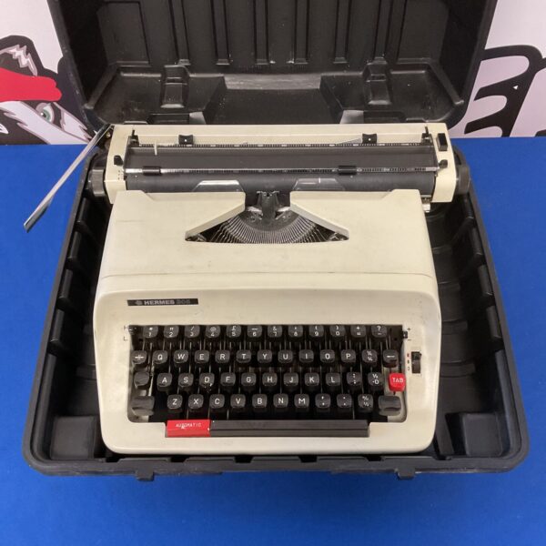 Vintage Hermes 305 typewriter, a classic mechanical portable.