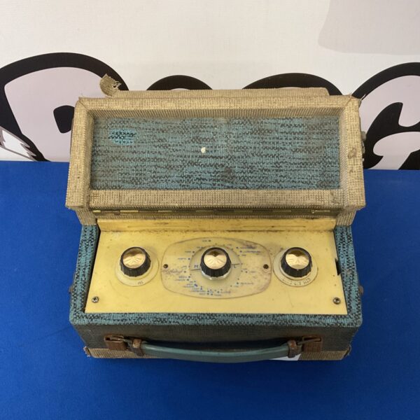 Vintage Sky Baronet transistor radio in cream and brown.