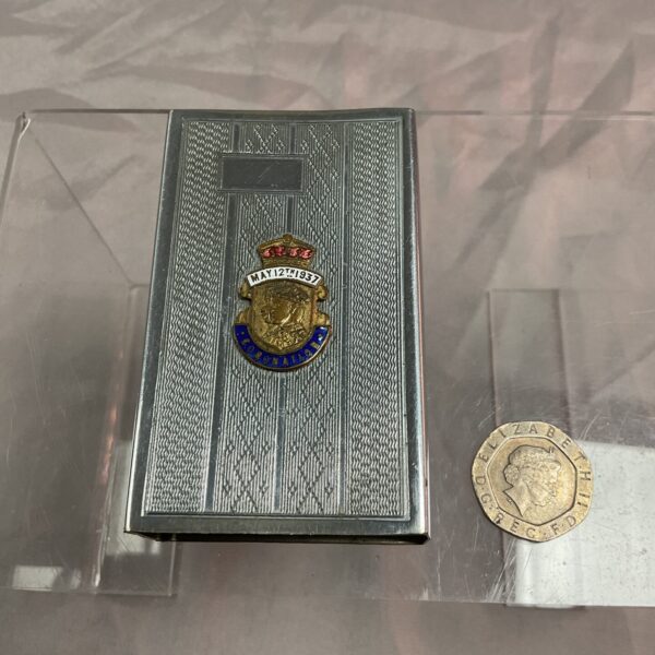 Silver plated 1937 coronation vesta case with enamel badge.