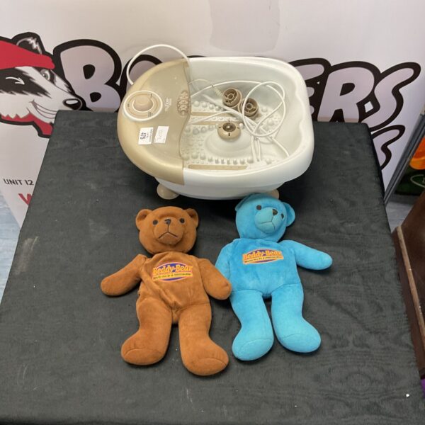 Myspa footspa with two beddy bear soft toys for home relaxation.
