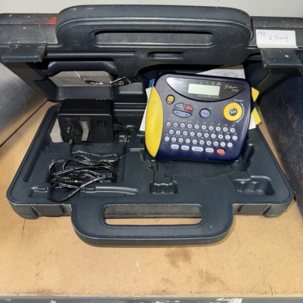 Vintage Brother P-Touch 1250 label printer with carrying case.