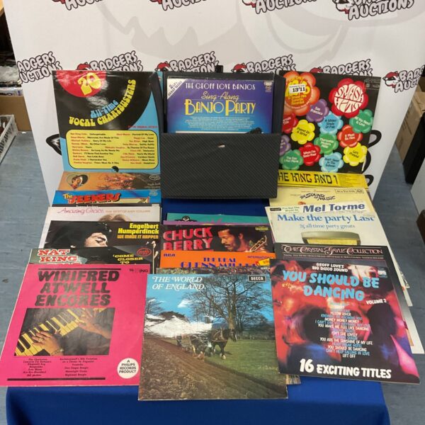 Vintage vinyl record collection including Chuck Berry records.