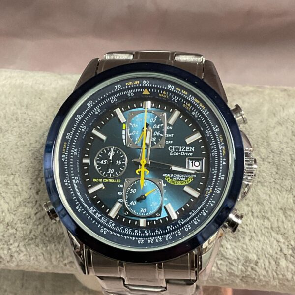 Close-up of a Citizen Eco Drive quartz wristwatch with stainless steel band.