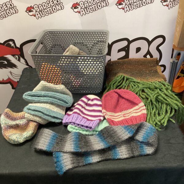 Colourful hand knitted hats and scarves bundle for winter warmth.