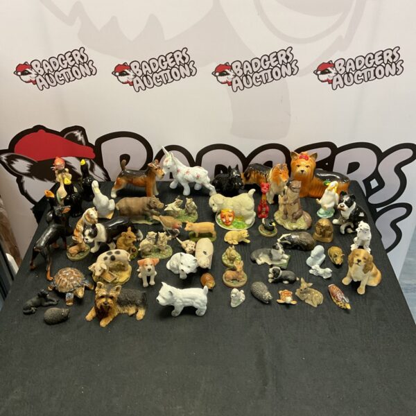 Collection of vintage ceramic animal ornaments and figurines.