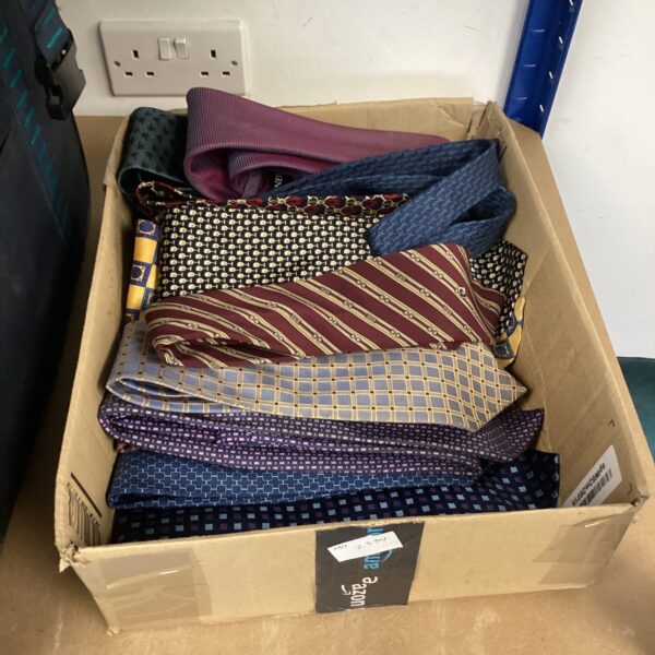 Mixed lot of vintage silk ties with patterned designs.