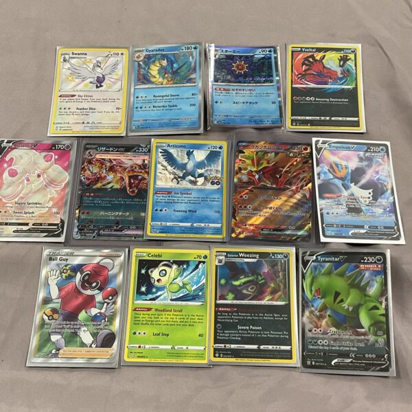 Lot of thirteen vintage Pokemon holo cards for collectors.