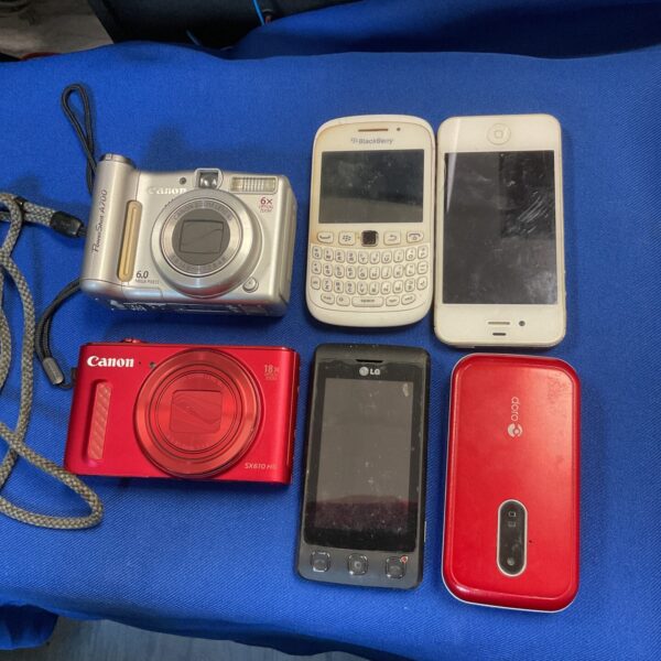 Digital camera bundle including Canon PowerShot and mobile phones.