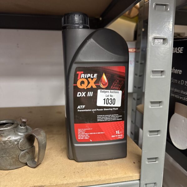 Triple QX ATF transmission fluid 1L bottle for automotive maintenance.
